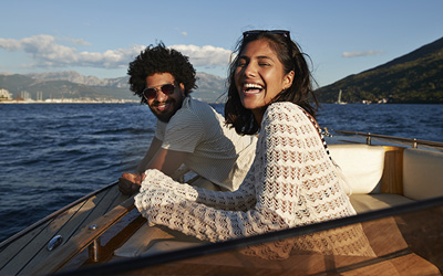 A couple relaxing on a boat
