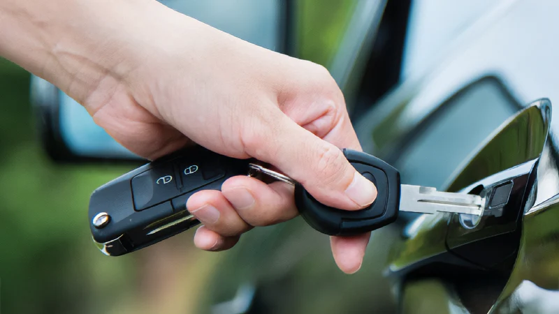 Man opening his car door