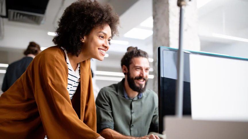 Employee sharing their screen with a coworker