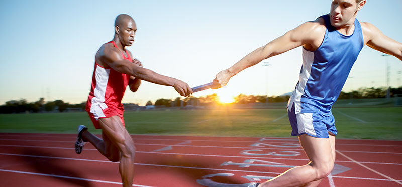 Passing the baton during a relay race