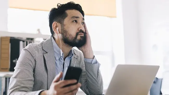 A man with earphones on