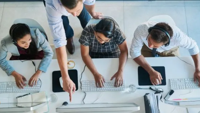People at their workstations