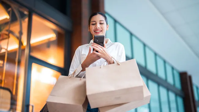A woman with shopping bags