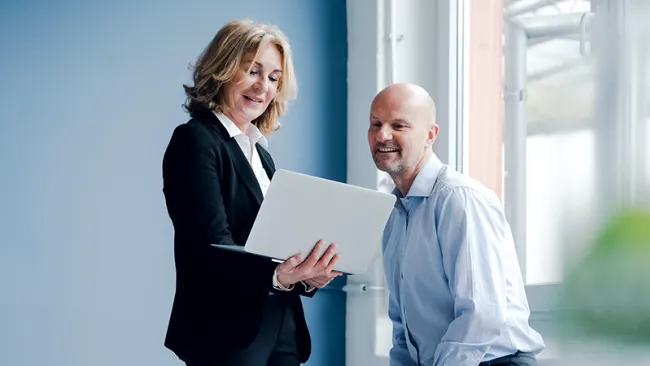 A man and a woman having a discussion 
