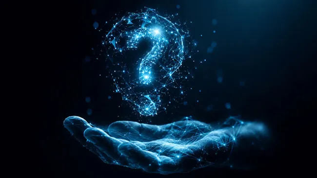 Digital image of question mark in a bubble, floating above a hand