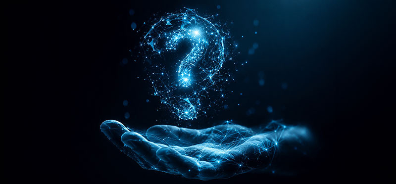 Digital image of question mark in a bubble, floating above a hand