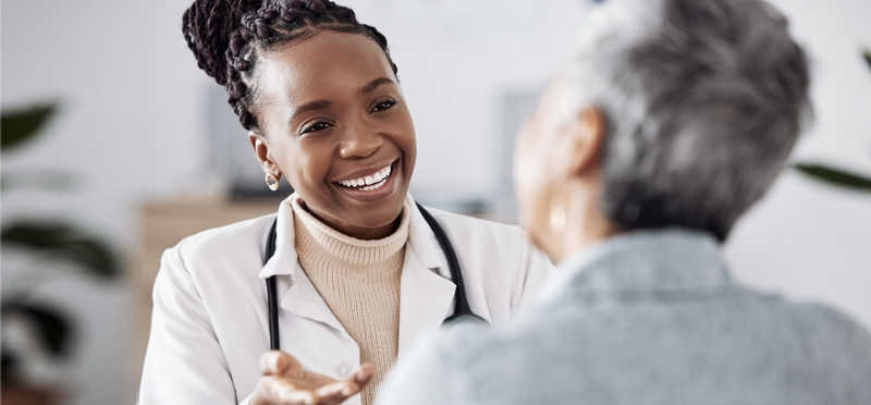 Doctor smiling at a patient