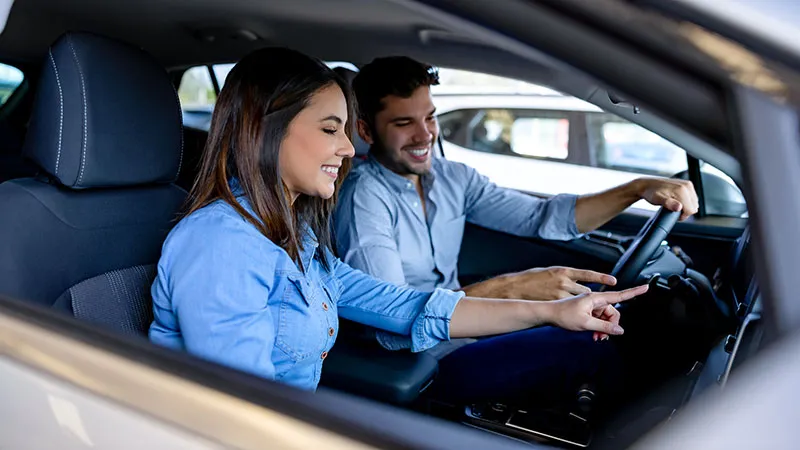 A man and a woman in a car