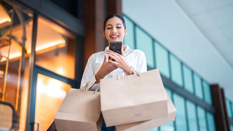 A woman with shopping bags