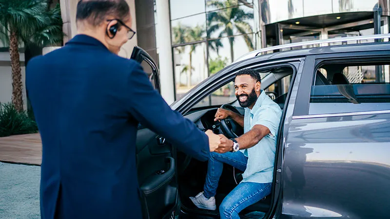 Two men doing a fist bump