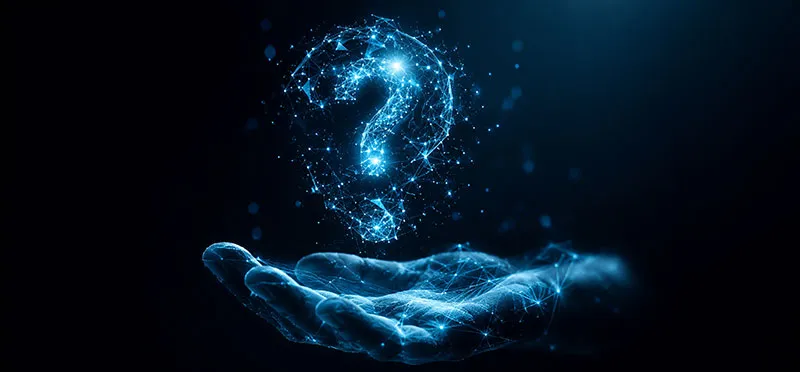 Digital image of question mark in a bubble, floating above a hand