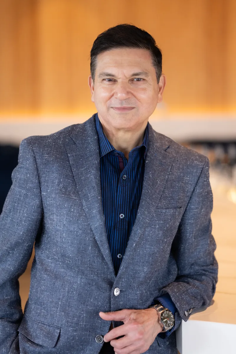 Headshot of  Capital One Auto President Sanjiv Yajnik 